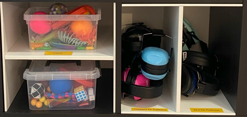 Pictured here are the colourful range of fidgets and ear protectors provided by the Museum